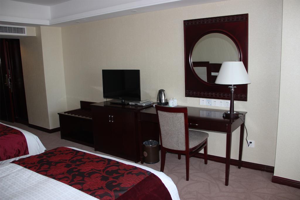 Dalian Southern Airline Pearl Hotel Номер фото