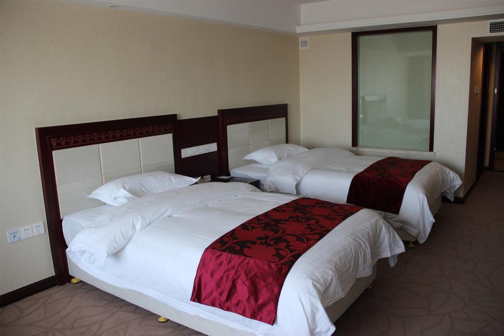 Dalian Southern Airline Pearl Hotel Номер фото